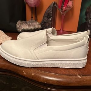 White sneakers slip in